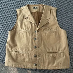 Wyoming traders vest. A couple stains. See pictures.